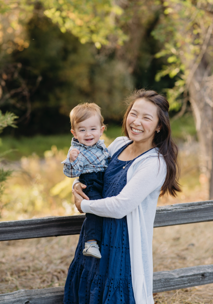 a mom holder her little boy in their denver family photography session 